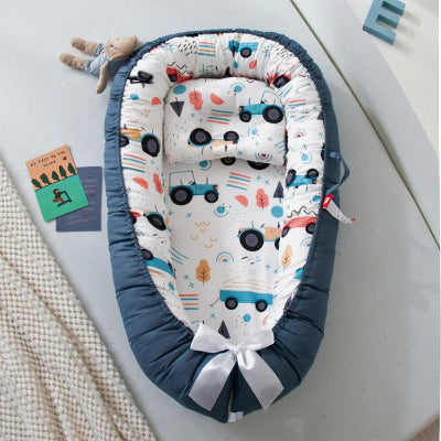 Reducteur- de- lit -BEBE-avec-des-motifs-de-tracteur