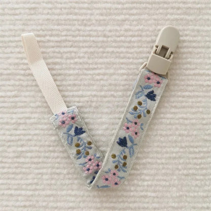 Attache tetine Fleurs rose