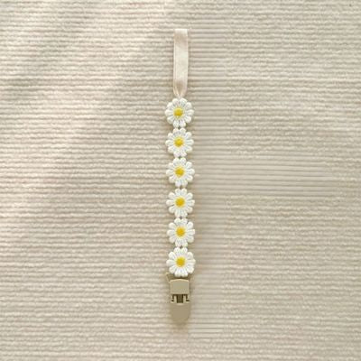 Attache-tetine-fleural-jaune