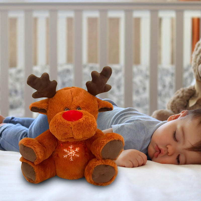 Bébé avec son petit renne au nez rouge