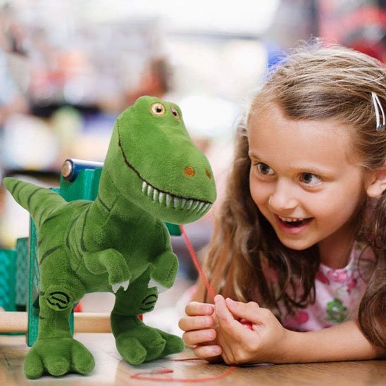 Dinosaure peluche avec fillette