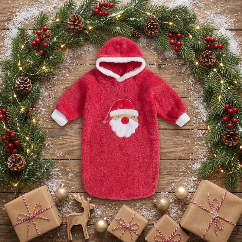 Gigoteuse bebe de Noël dans couronne et cadeaux