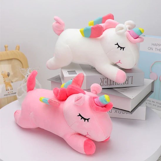 Licorne peluche rose et blanche