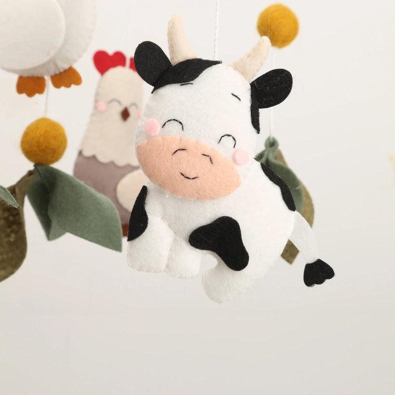 Mobile bebe vache feutrine fait main