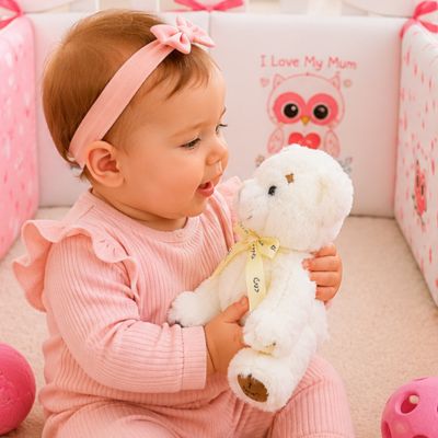 Ours-peluche-blanc-en-discution-avec-bebe