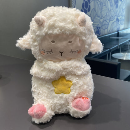 Peluche relaxante qui respire mouton rose