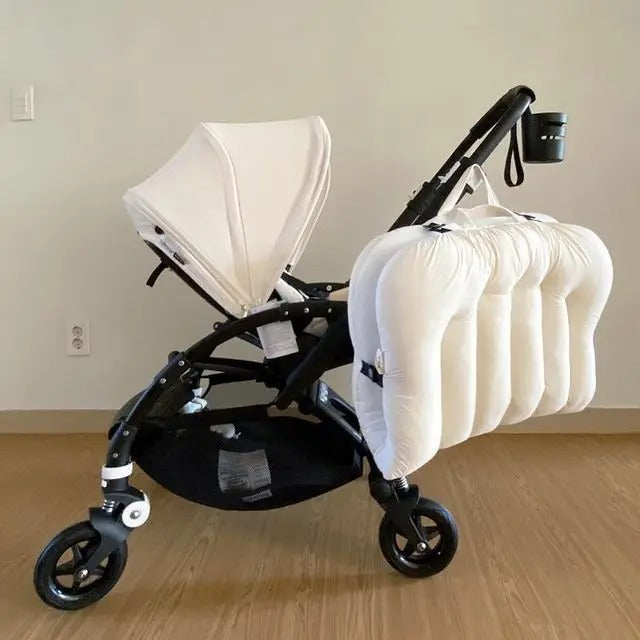 Reducteur de lit 6-12 mois pliable accroché à poussette
