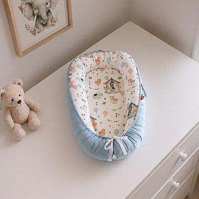 Reducteur de lit bebe manège