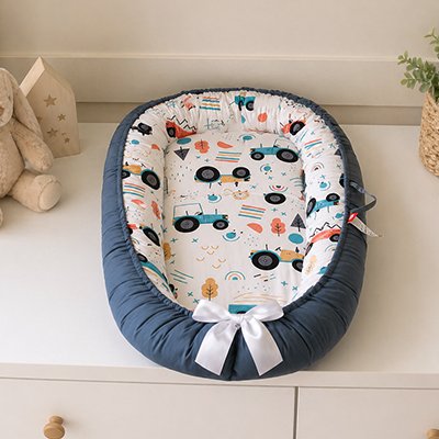 Reducteur de lit bebe tracteur