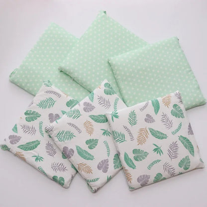 Tour-de-lit-original-bebe-coussins-verts