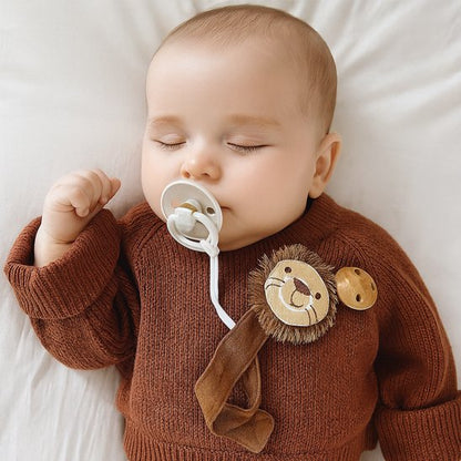 Attache- tétine- lion