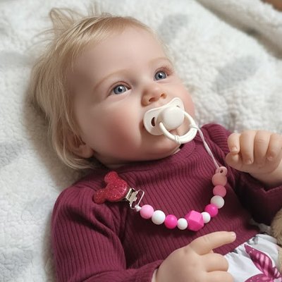 Attache- tétine -rose