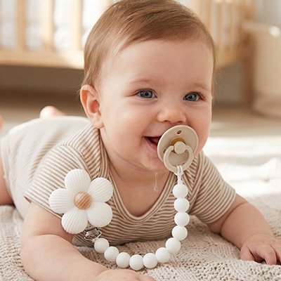 Attache- tétine -tissu-pratique