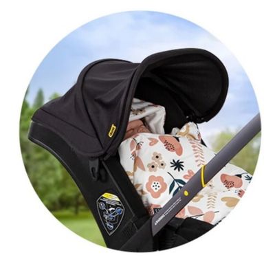 bébé au chaud dans son nid d Ange siege auto