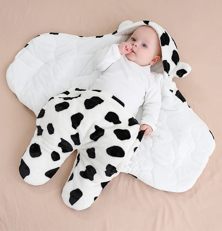 bébé dans nid d'ange peau de vache