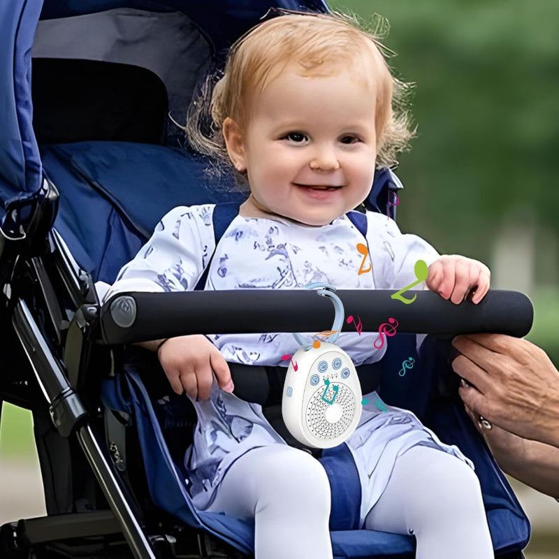 bébé en poussette avec sa veilleuse bébé bruit blanc