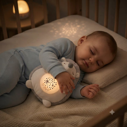 bébé fait câlin veilleuse projection bebe hérisson