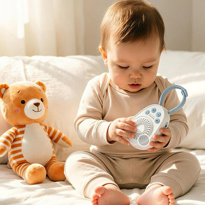 bébé qui manipule sa veilleuse bébé bruit blanc