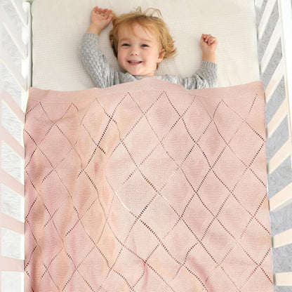 Couverture bebe tricot fait la joie de Léo