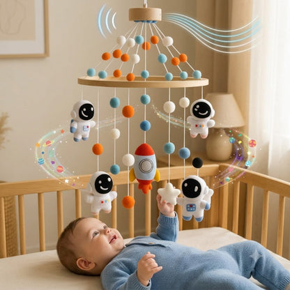 mobile lit bebe  développe l'éveil sensoriel de bébé