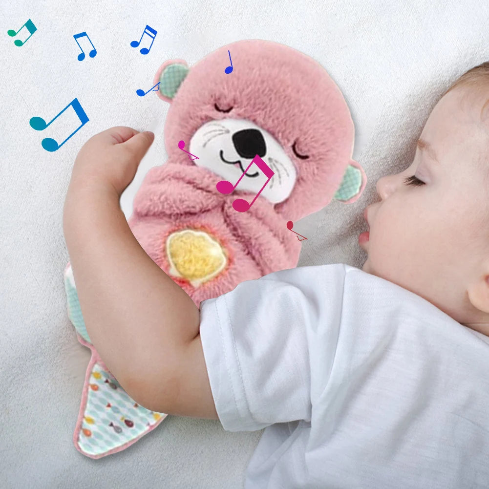 peluche-loutre-musicale-avec-bébé-qui-dort