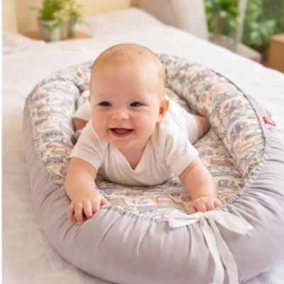 réducteur-de-lit-cododo-bebe-content