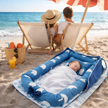 reducteur-de-lit-6-12-mois-a-la-mer-avec-bebe