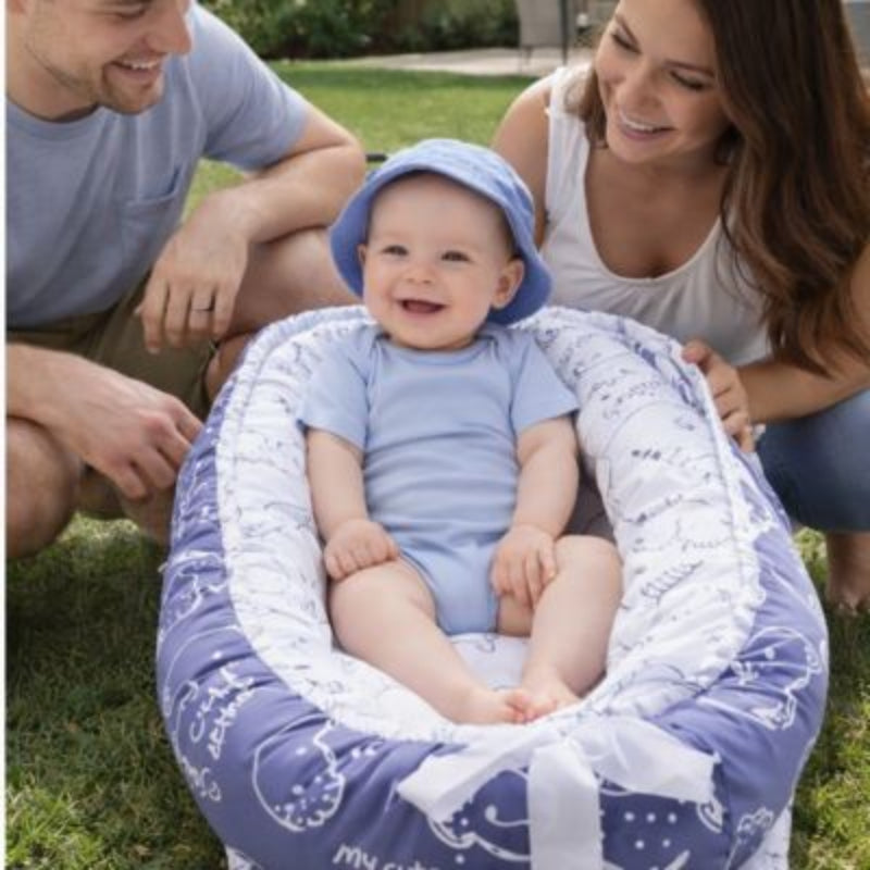 reducteur-de-lit-6-12mois-dehors-cour