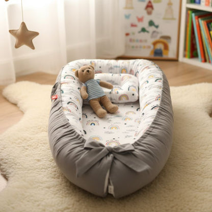réducteur de lit bebe arc-en-ciel