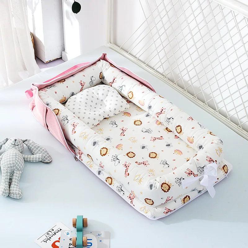 reducteur-de-lit-bebe-pliable-en-coton-avec-motif-de-lion-rose