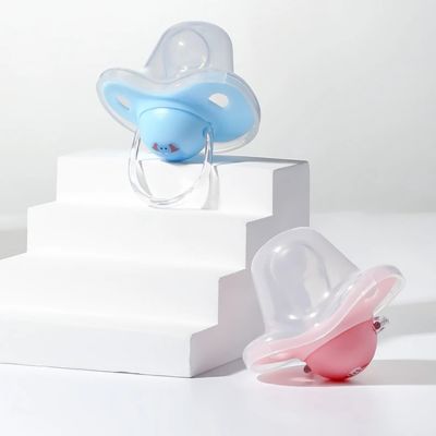 tetine avec couvercle