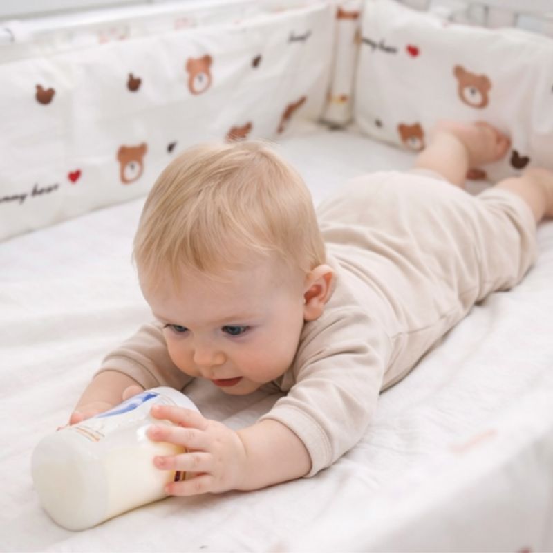 tour-de-lir-ourson-bebe-biberon-lait