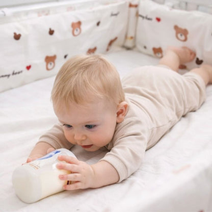 tour-de-lir-ourson-bebe-biberon-lait