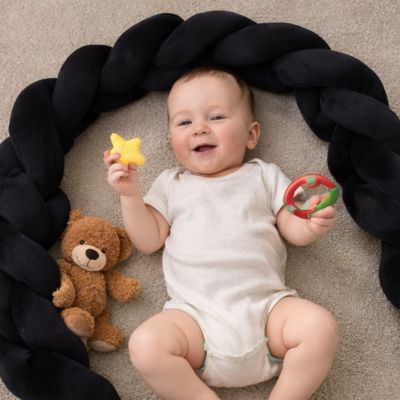 tresse-de-lit-bebe-couche-tapis-salon