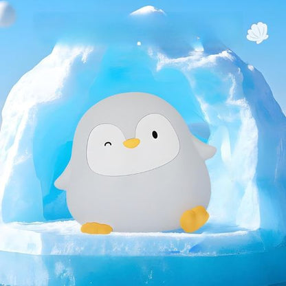 Veilleuse LED petit pingouin sur la glace