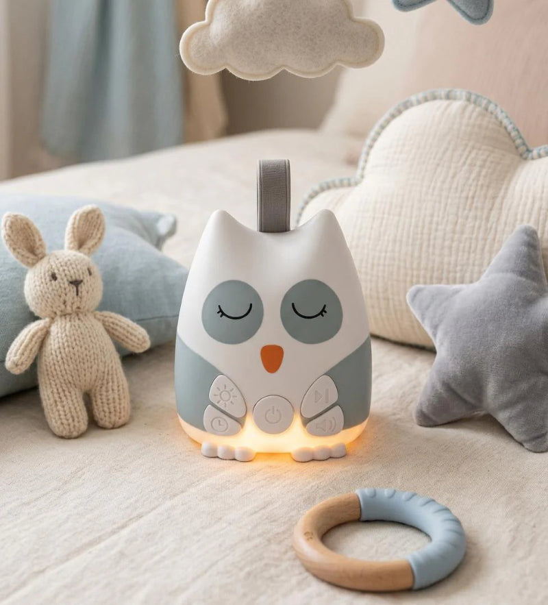 Veilleuse bruit blanc bébé allumée à sa base